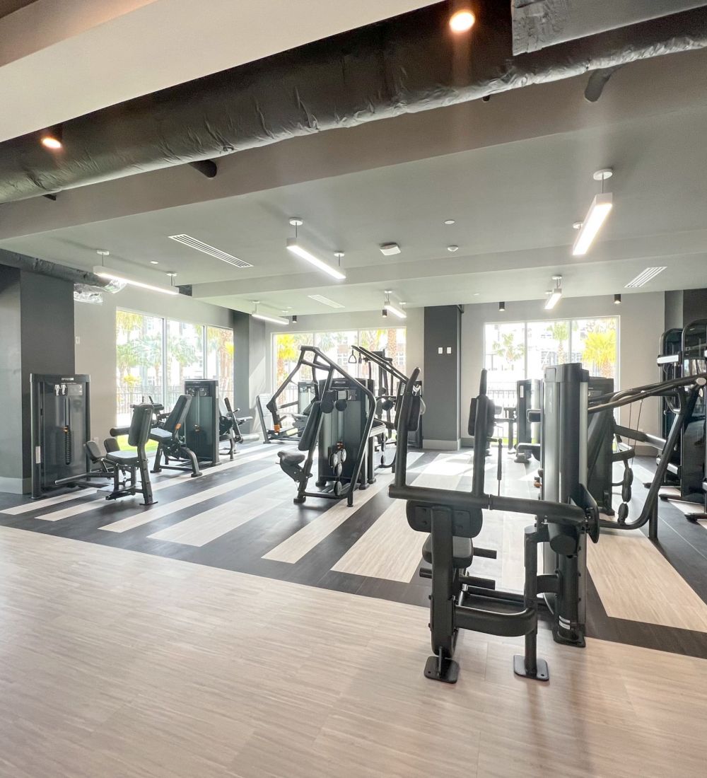 Apartment gym with state-of-the-art equipment and cardio machines at The Lucent at Sunrise