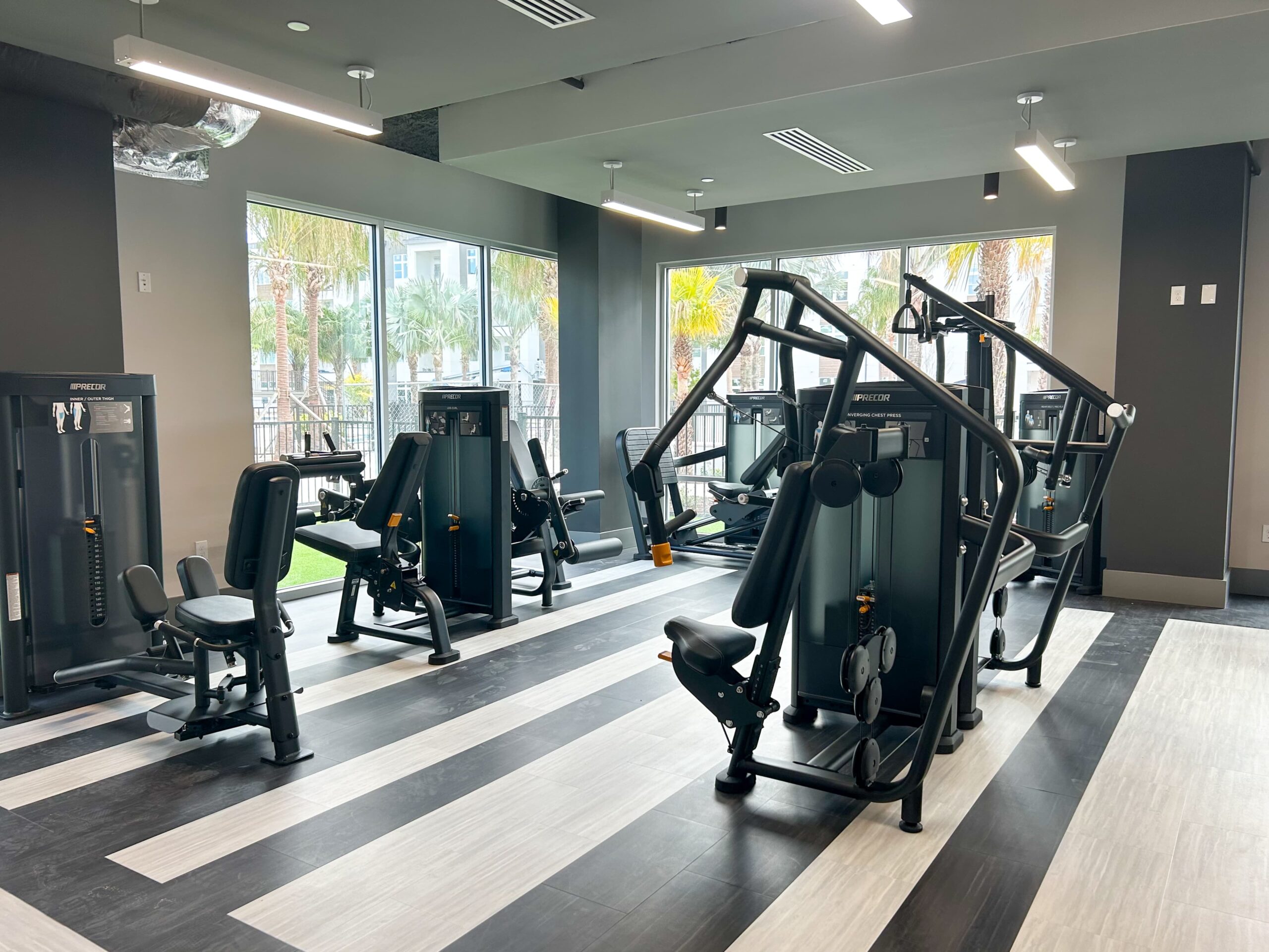 The Lucent at Sunrise resident gym with weight machines and cardio machines