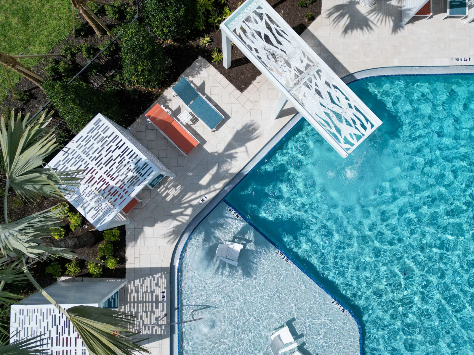 The Lucent Two Zero-Entry Resort Style Pools with Sunloungers